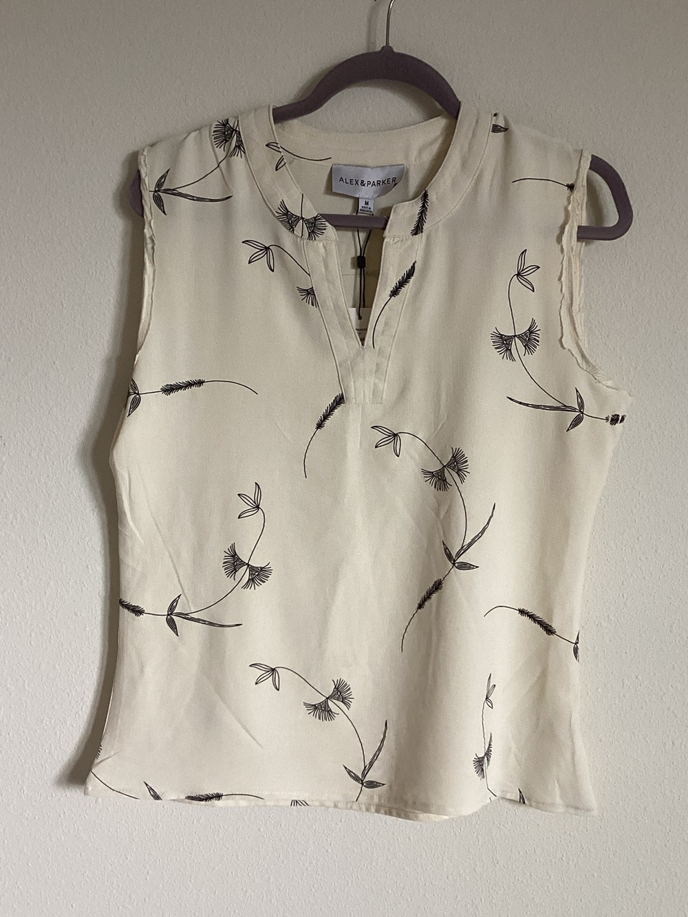 Cream Sleeveless Floral Split-Neck Top